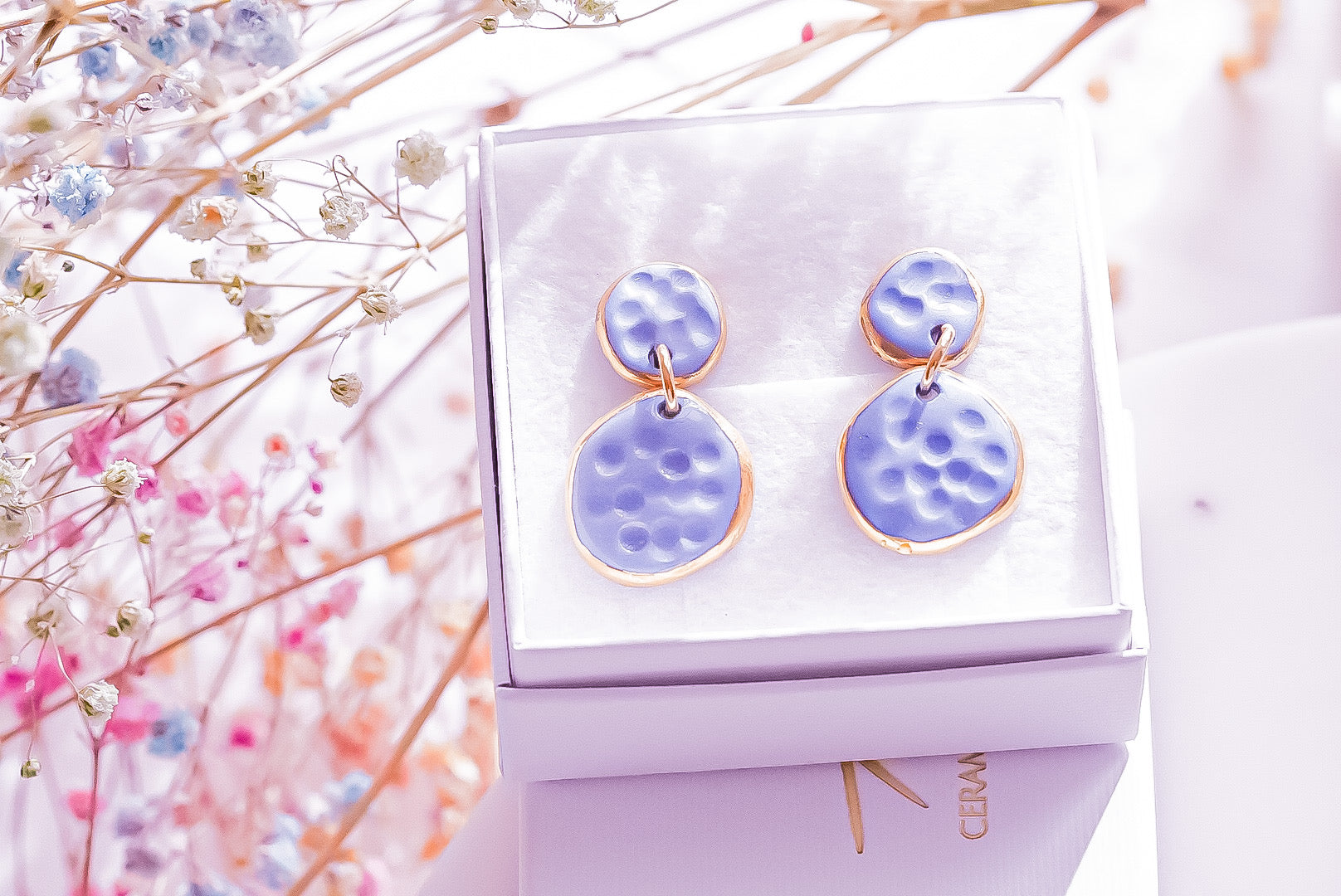 Earrings in Soft Blue with Golden rim